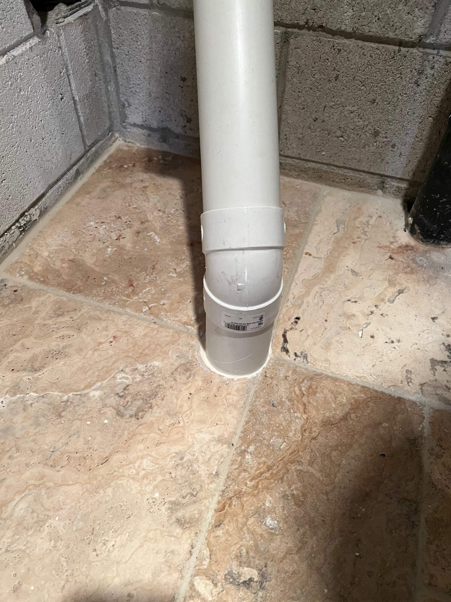 Radon mitigation system connected to a sump pit