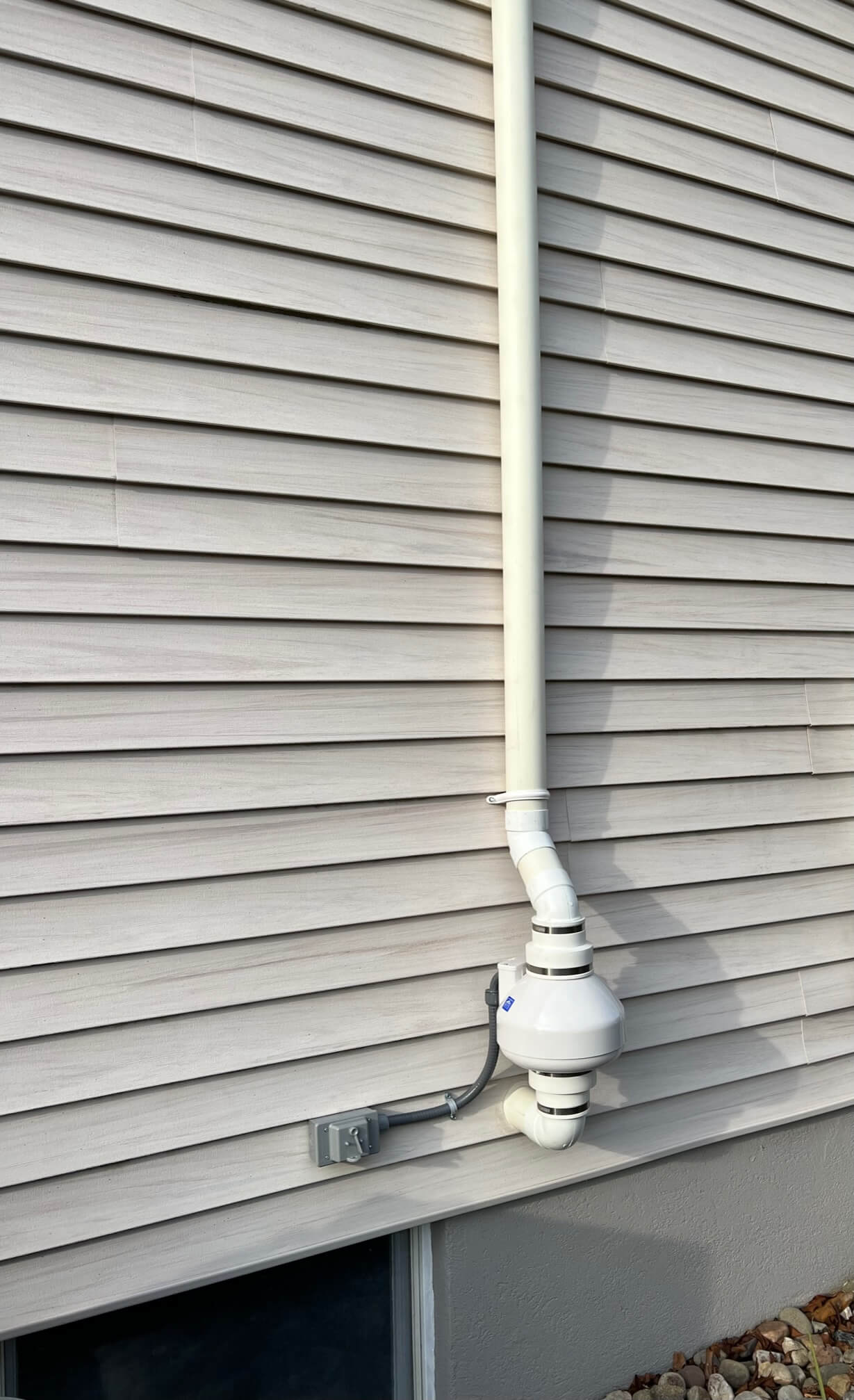 Residential radon mitigation system with clear labeling
