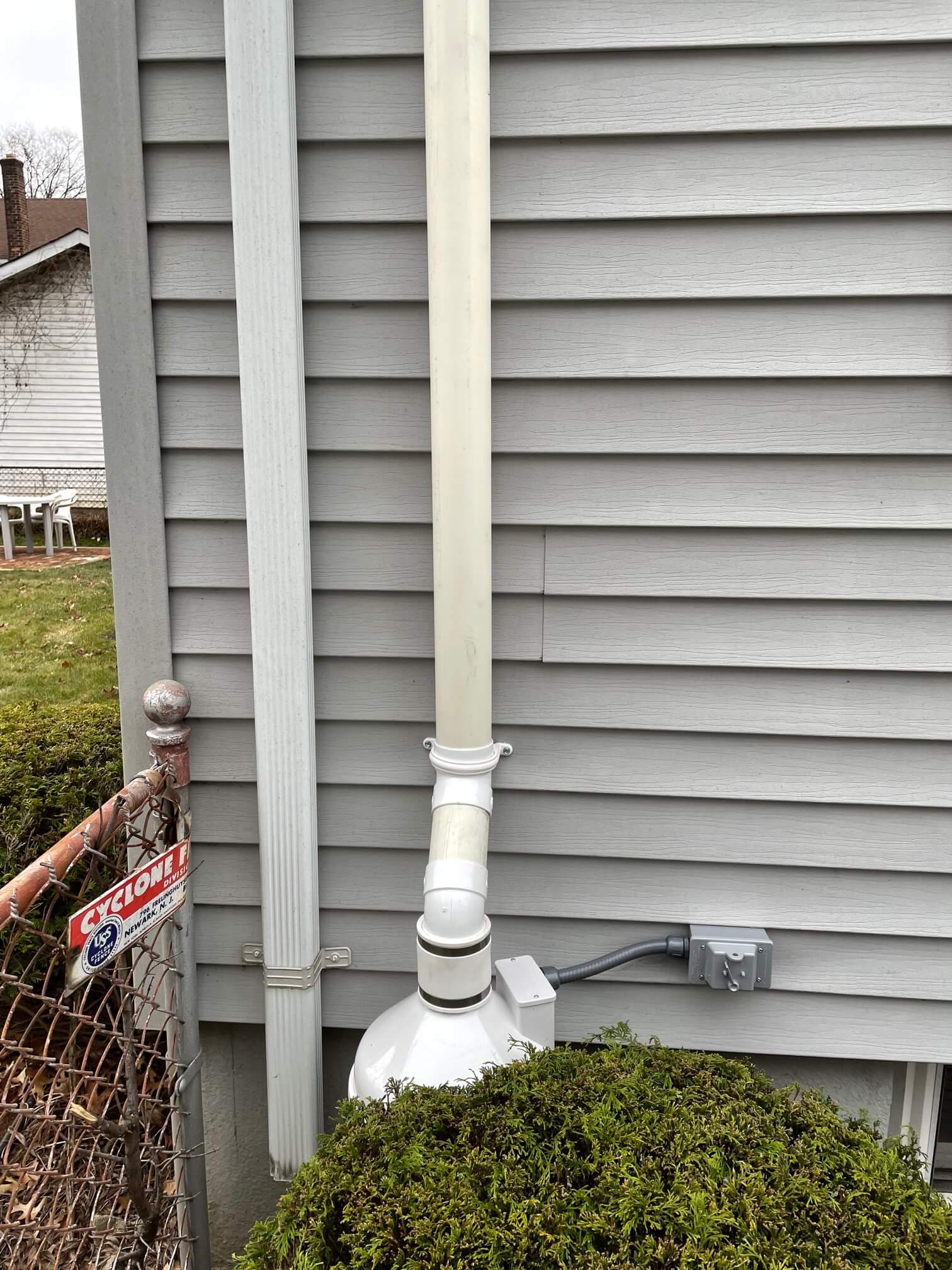 Radon mitigation system installed in a residential basement